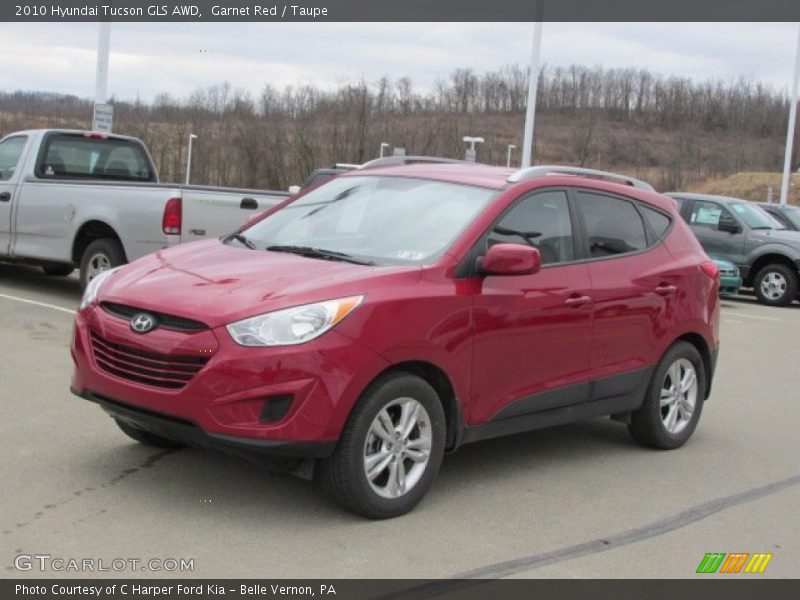Garnet Red / Taupe 2010 Hyundai Tucson GLS AWD