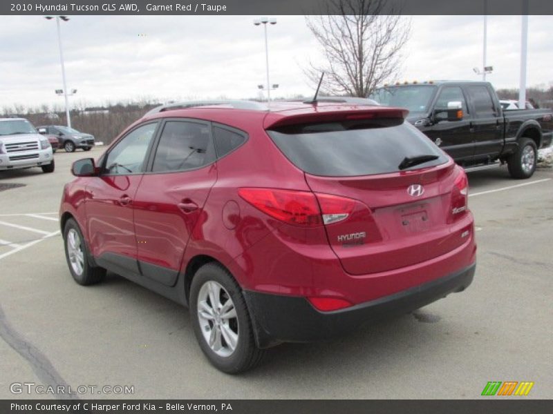 Garnet Red / Taupe 2010 Hyundai Tucson GLS AWD