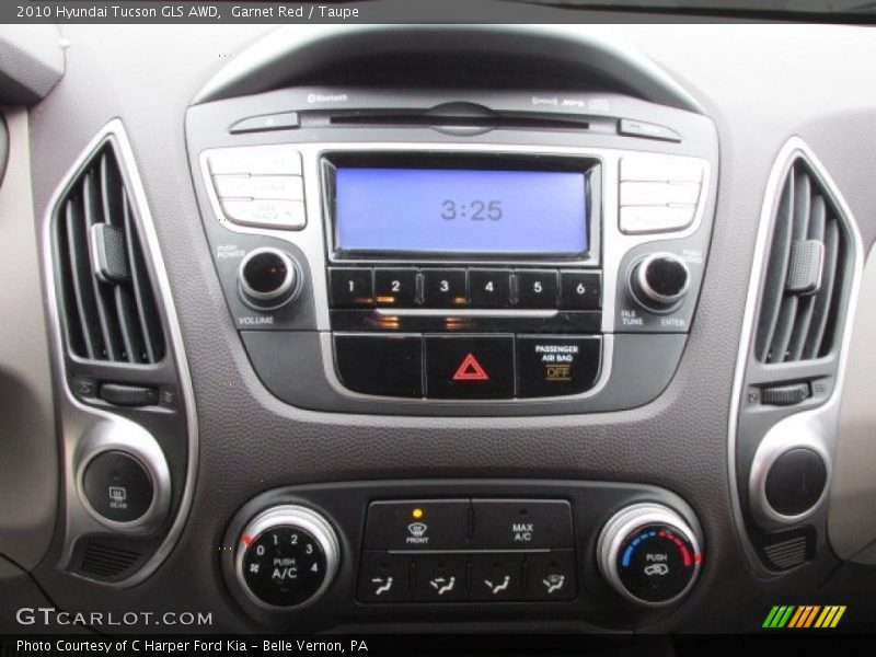 Garnet Red / Taupe 2010 Hyundai Tucson GLS AWD