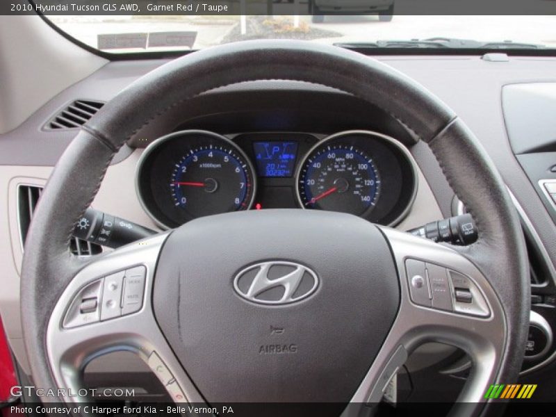 Garnet Red / Taupe 2010 Hyundai Tucson GLS AWD