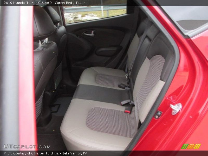 Garnet Red / Taupe 2010 Hyundai Tucson GLS AWD