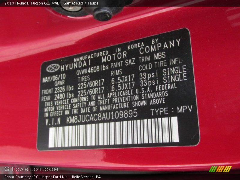 Garnet Red / Taupe 2010 Hyundai Tucson GLS AWD