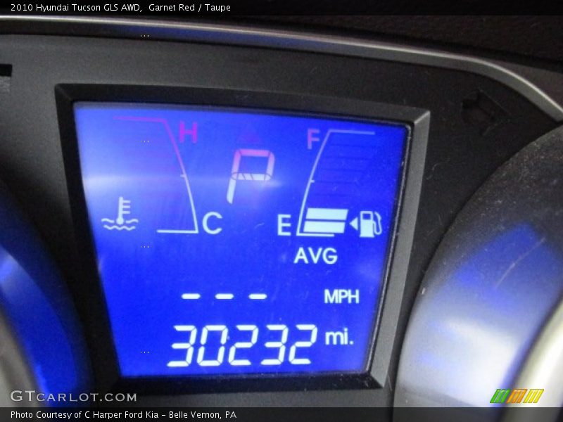 Garnet Red / Taupe 2010 Hyundai Tucson GLS AWD