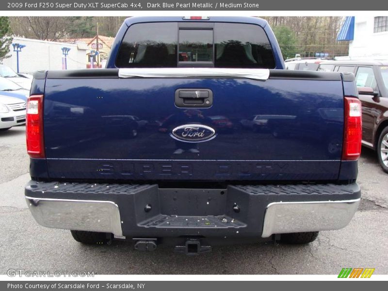 Dark Blue Pearl Metallic / Medium Stone 2009 Ford F250 Super Duty XLT SuperCab 4x4