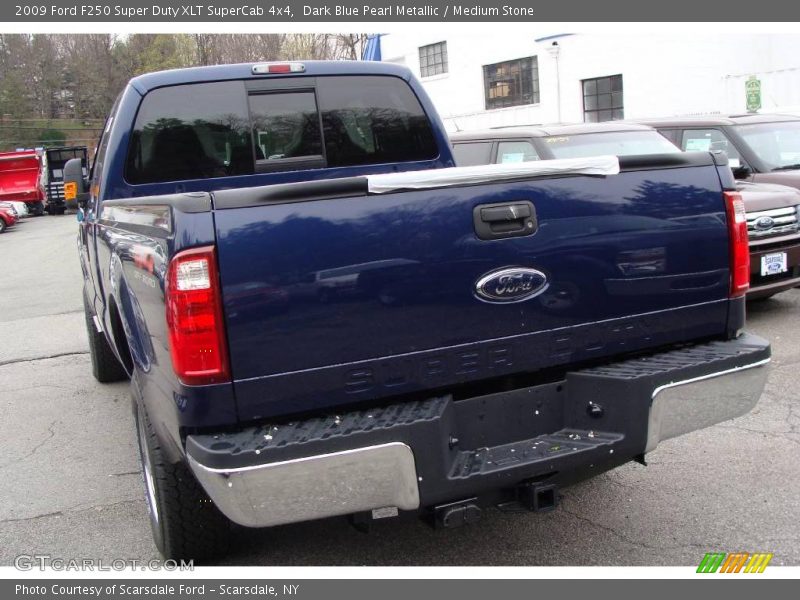 Dark Blue Pearl Metallic / Medium Stone 2009 Ford F250 Super Duty XLT SuperCab 4x4