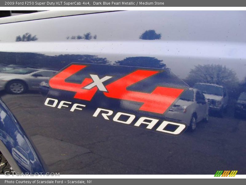 Dark Blue Pearl Metallic / Medium Stone 2009 Ford F250 Super Duty XLT SuperCab 4x4