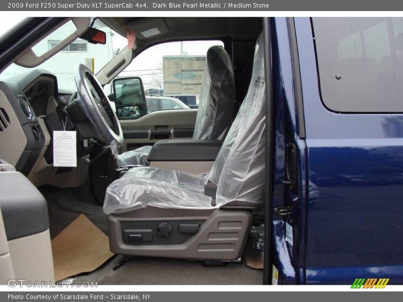 Dark Blue Pearl Metallic / Medium Stone 2009 Ford F250 Super Duty XLT SuperCab 4x4