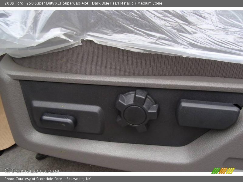 Dark Blue Pearl Metallic / Medium Stone 2009 Ford F250 Super Duty XLT SuperCab 4x4