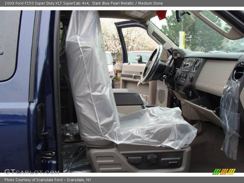 Dark Blue Pearl Metallic / Medium Stone 2009 Ford F250 Super Duty XLT SuperCab 4x4