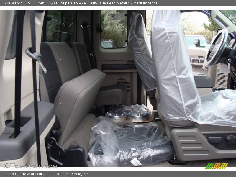 Dark Blue Pearl Metallic / Medium Stone 2009 Ford F250 Super Duty XLT SuperCab 4x4