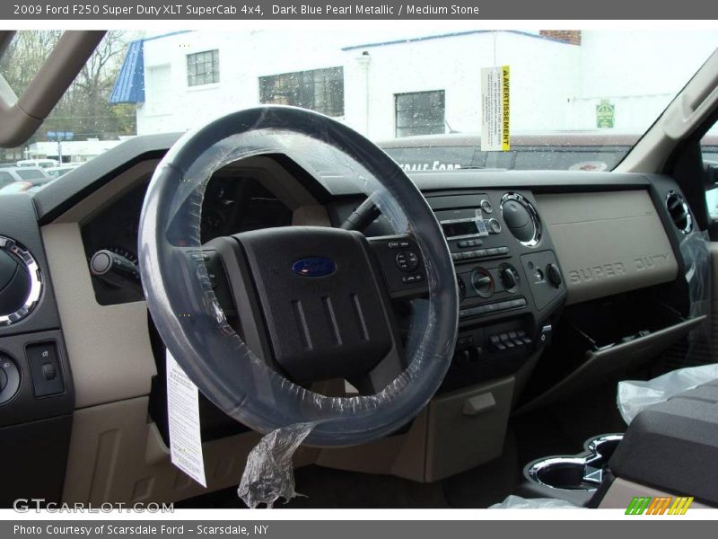 Dark Blue Pearl Metallic / Medium Stone 2009 Ford F250 Super Duty XLT SuperCab 4x4