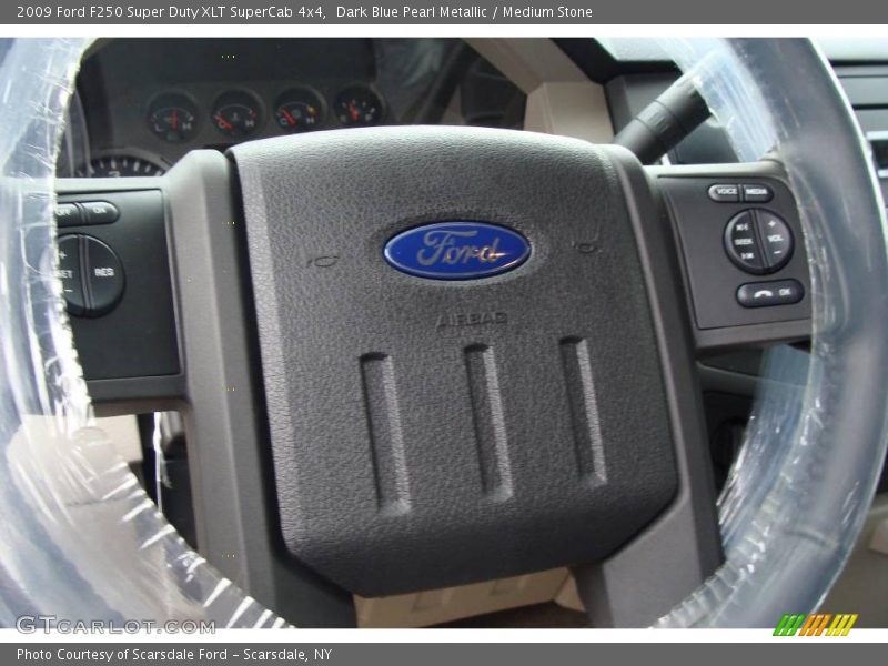 Dark Blue Pearl Metallic / Medium Stone 2009 Ford F250 Super Duty XLT SuperCab 4x4