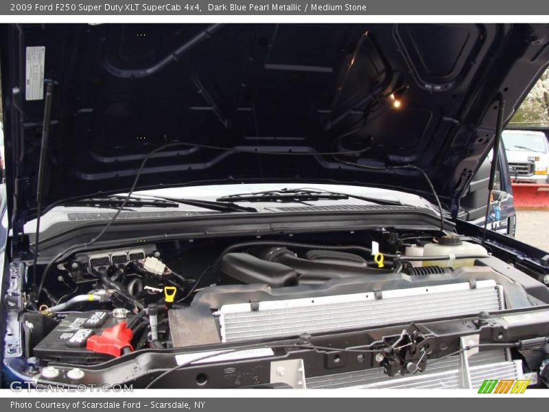 Dark Blue Pearl Metallic / Medium Stone 2009 Ford F250 Super Duty XLT SuperCab 4x4