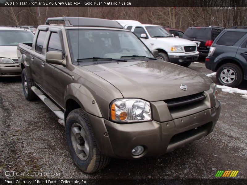 Gold Rush Metallic / Beige 2001 Nissan Frontier SE V6 Crew Cab 4x4