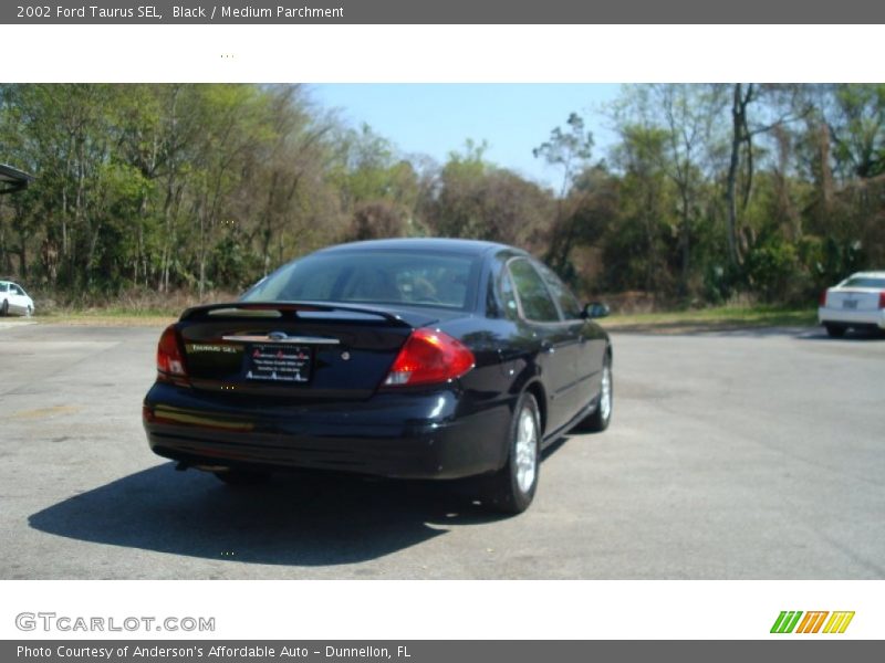 Black / Medium Parchment 2002 Ford Taurus SEL