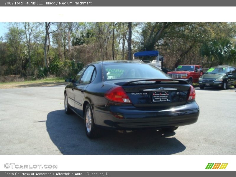 Black / Medium Parchment 2002 Ford Taurus SEL