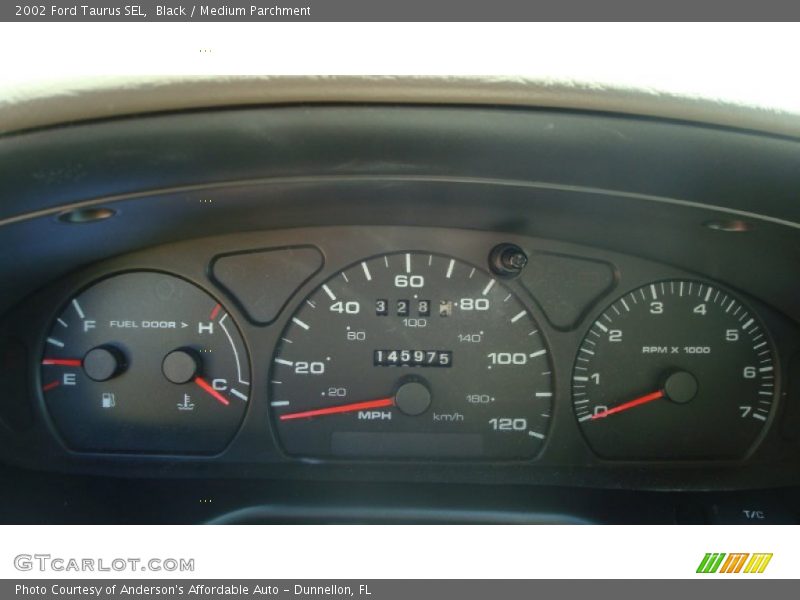 Black / Medium Parchment 2002 Ford Taurus SEL