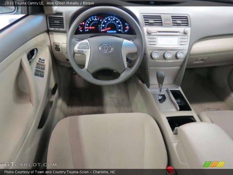 Aloe Green Metallic / Bisque 2010 Toyota Camry LE