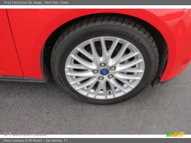 Race Red / Stone 2012 Ford Focus SEL Sedan
