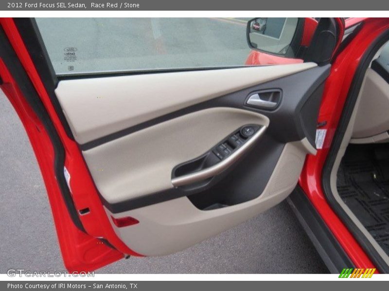 Race Red / Stone 2012 Ford Focus SEL Sedan