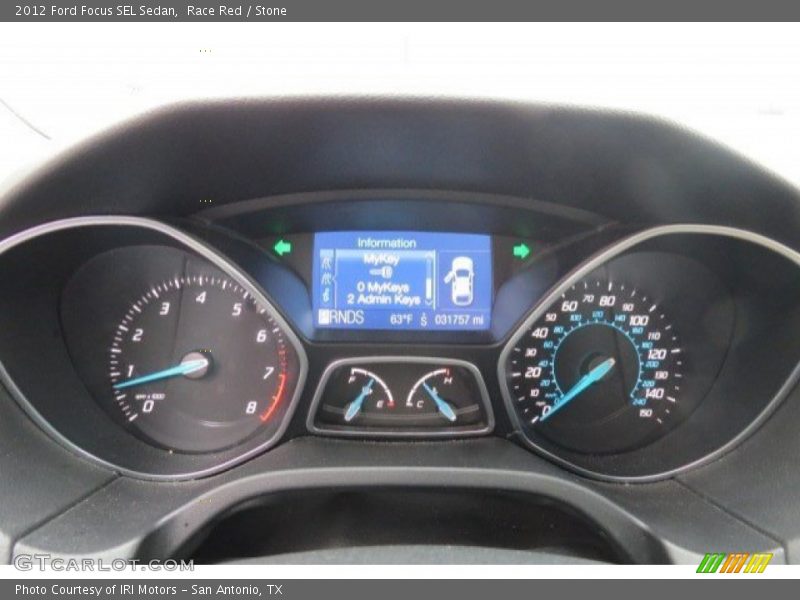 Race Red / Stone 2012 Ford Focus SEL Sedan