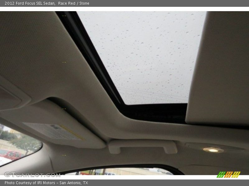 Race Red / Stone 2012 Ford Focus SEL Sedan