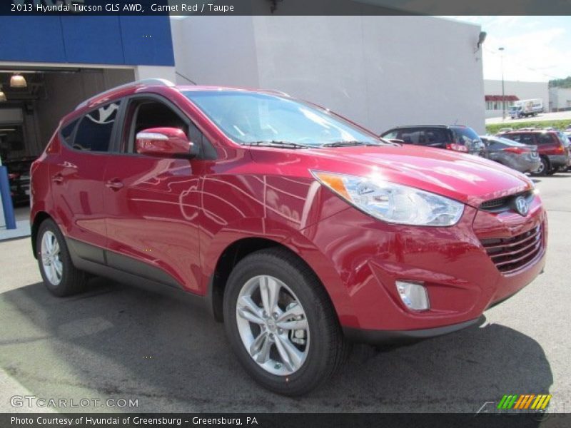 Garnet Red / Taupe 2013 Hyundai Tucson GLS AWD