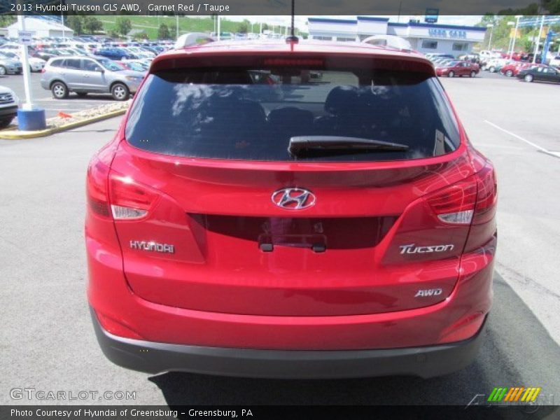 Garnet Red / Taupe 2013 Hyundai Tucson GLS AWD