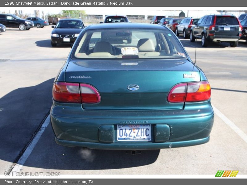 Dark Jade Green Metallic / Medium Oak 1998 Chevrolet Malibu Sedan