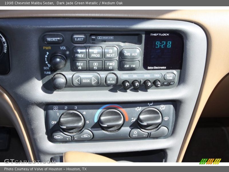 Dark Jade Green Metallic / Medium Oak 1998 Chevrolet Malibu Sedan