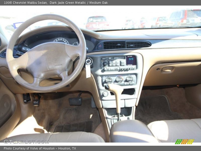 Dark Jade Green Metallic / Medium Oak 1998 Chevrolet Malibu Sedan