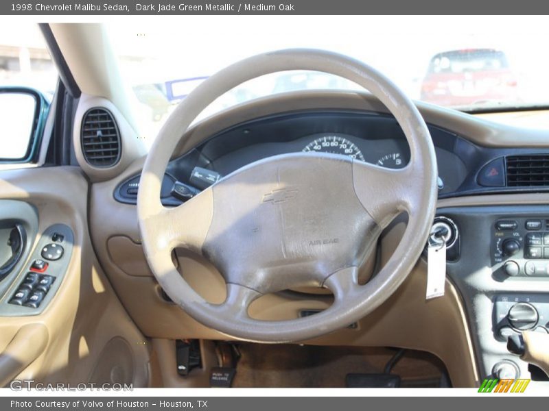 Dark Jade Green Metallic / Medium Oak 1998 Chevrolet Malibu Sedan