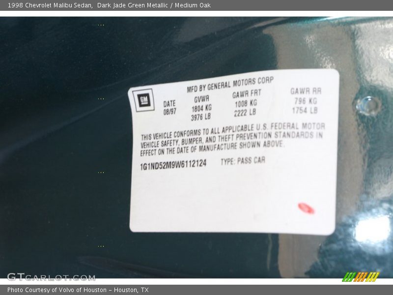 Dark Jade Green Metallic / Medium Oak 1998 Chevrolet Malibu Sedan