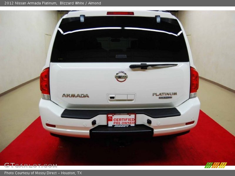 Blizzard White / Almond 2012 Nissan Armada Platinum