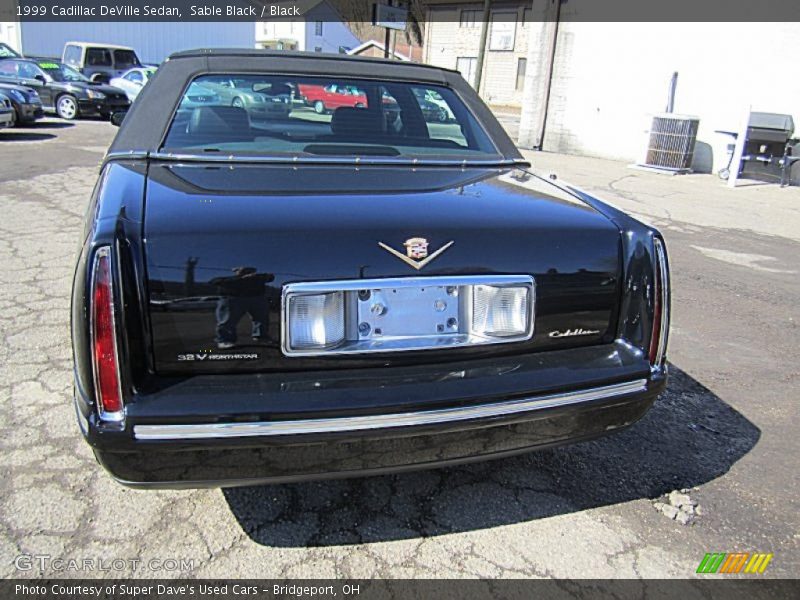 Sable Black / Black 1999 Cadillac DeVille Sedan