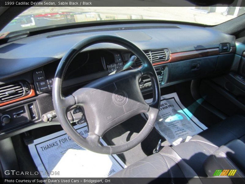 Sable Black / Black 1999 Cadillac DeVille Sedan