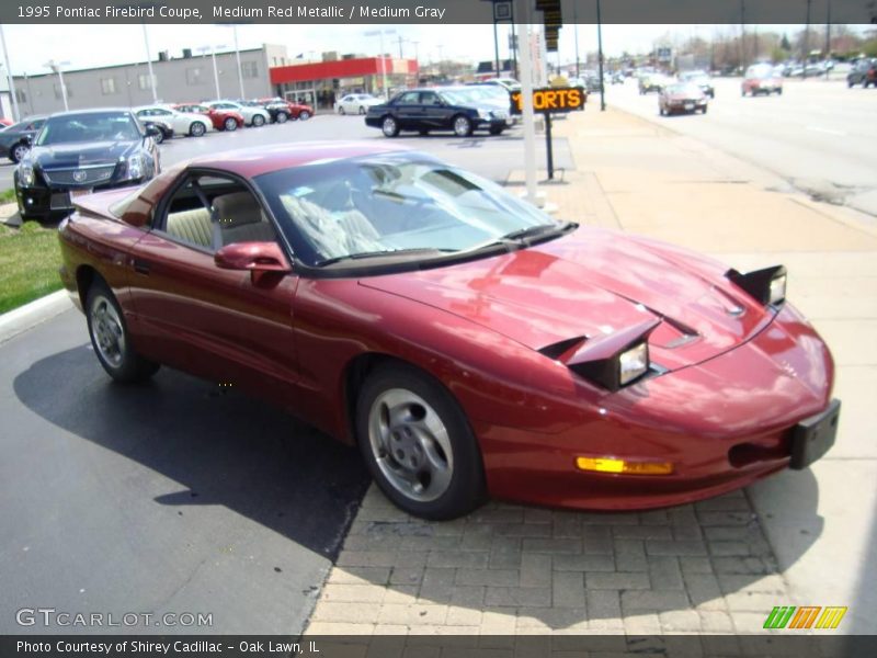 Medium Red Metallic / Medium Gray 1995 Pontiac Firebird Coupe