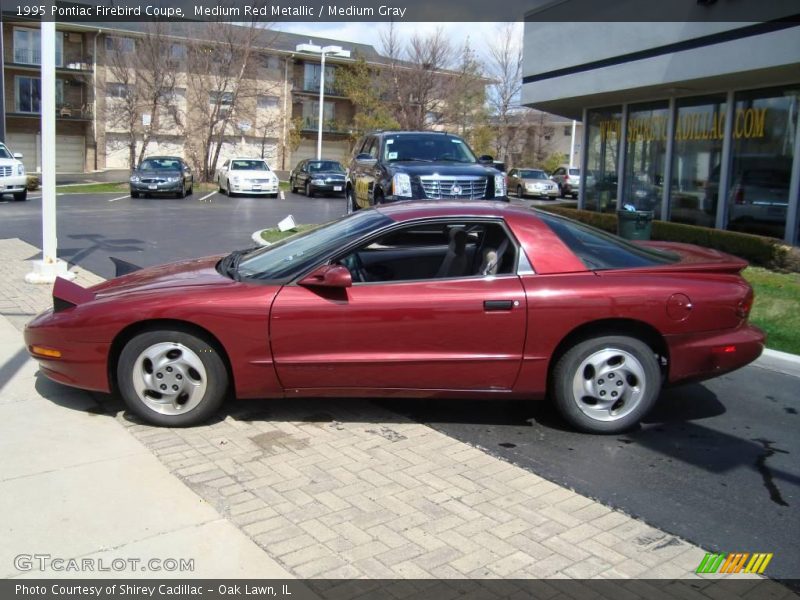 Medium Red Metallic / Medium Gray 1995 Pontiac Firebird Coupe