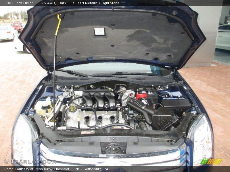 Dark Blue Pearl Metallic / Light Stone 2007 Ford Fusion SEL V6 AWD