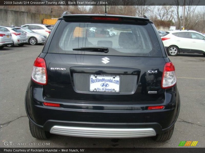 Black Pearl Metallic / Black 2009 Suzuki SX4 Crossover Touring AWD