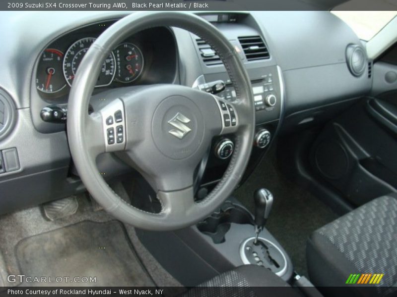 Black Pearl Metallic / Black 2009 Suzuki SX4 Crossover Touring AWD