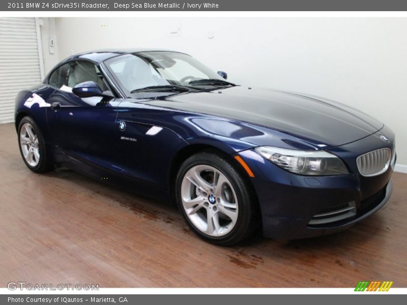 Deep Sea Blue Metallic / Ivory White 2011 BMW Z4 sDrive35i Roadster