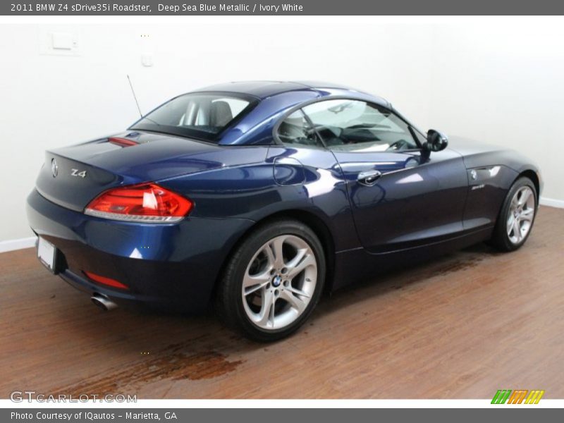 Deep Sea Blue Metallic / Ivory White 2011 BMW Z4 sDrive35i Roadster