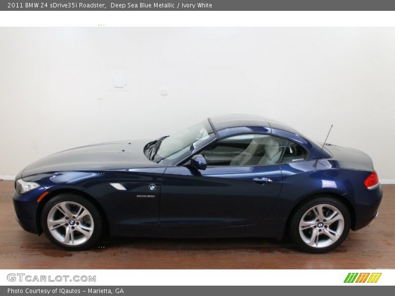 Deep Sea Blue Metallic / Ivory White 2011 BMW Z4 sDrive35i Roadster