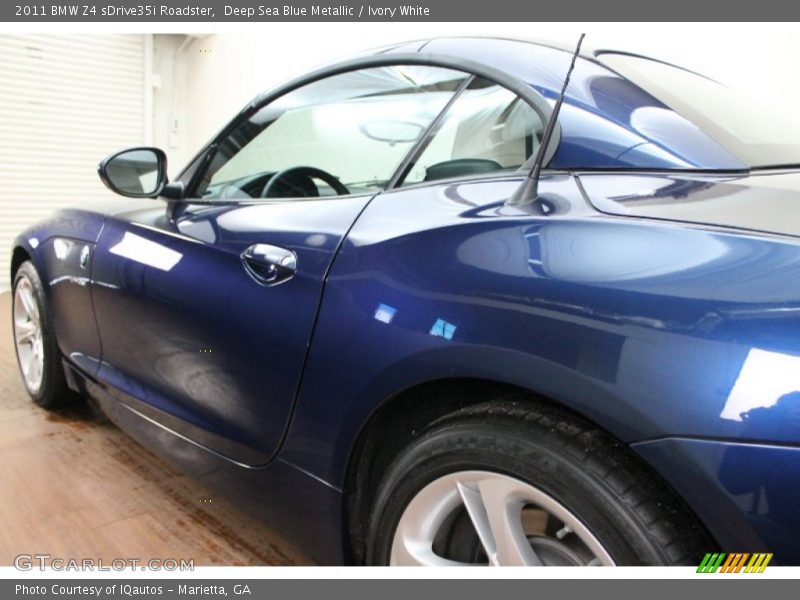 Deep Sea Blue Metallic / Ivory White 2011 BMW Z4 sDrive35i Roadster