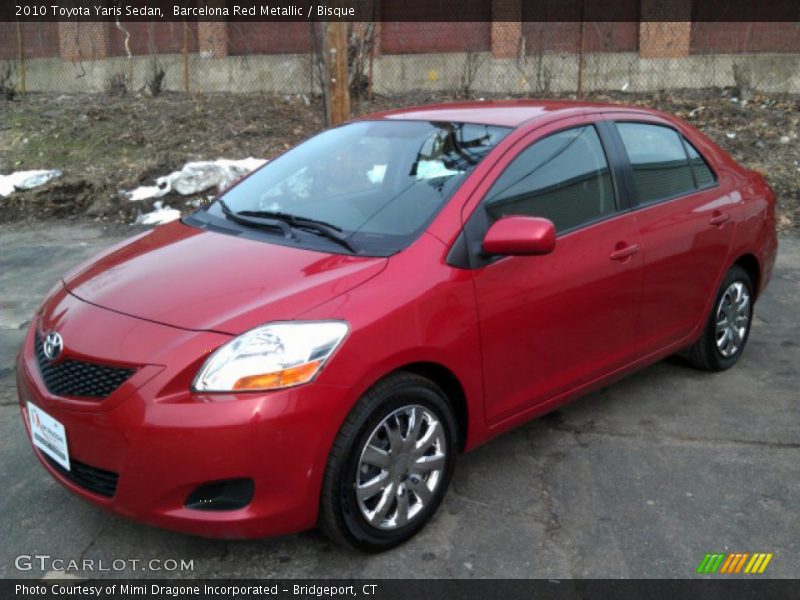 Barcelona Red Metallic / Bisque 2010 Toyota Yaris Sedan