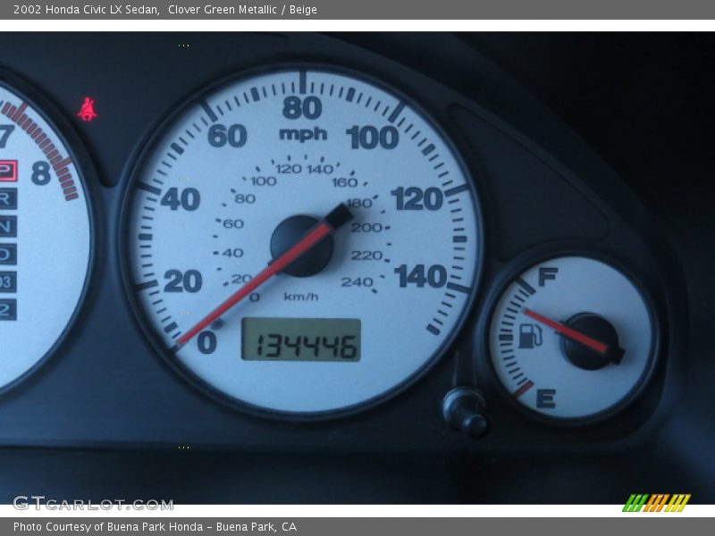 Clover Green Metallic / Beige 2002 Honda Civic LX Sedan