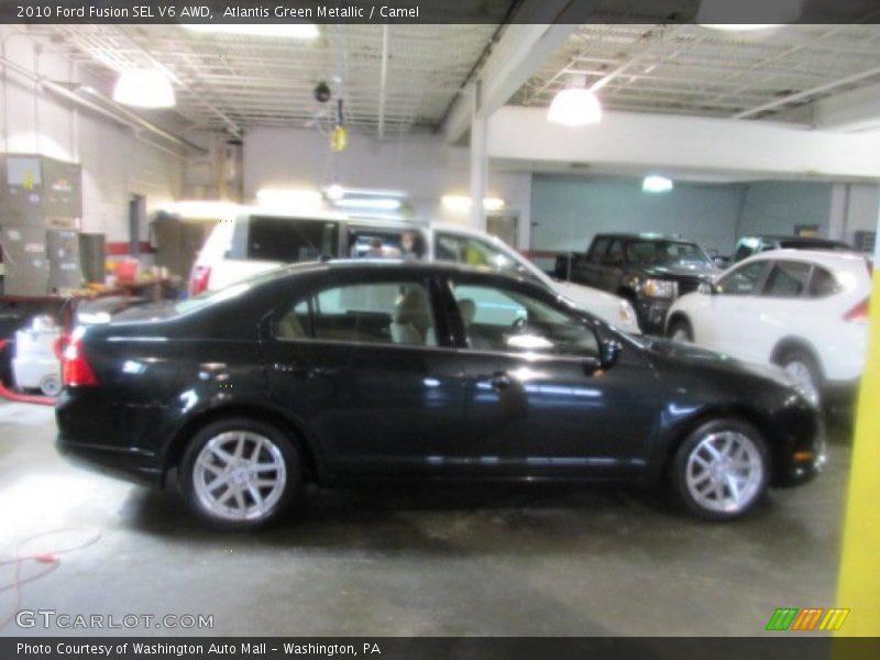 Atlantis Green Metallic / Camel 2010 Ford Fusion SEL V6 AWD