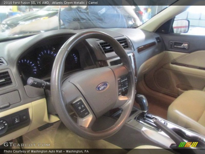 Atlantis Green Metallic / Camel 2010 Ford Fusion SEL V6 AWD
