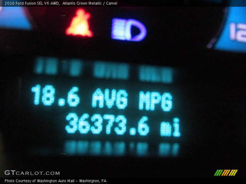 Atlantis Green Metallic / Camel 2010 Ford Fusion SEL V6 AWD
